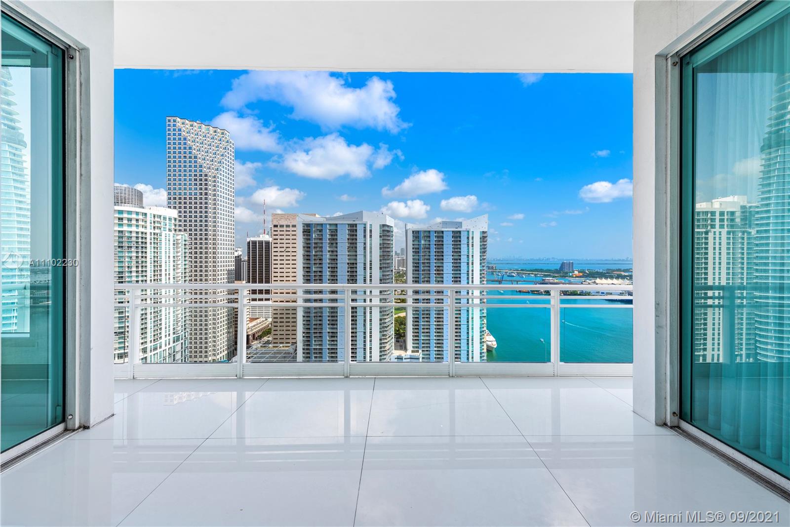 900 Brickell Key Boulevard, Unit 2902 Miami, FL 33131 - Photo 5 of 32 a view of balcony with two chairs