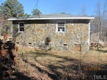 8517 Ray Road Raleigh, NC 27613 - Photo 3 of 5 a front view of a house
