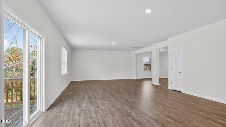 212 Calebs Cor Place Spring Lake, NC 28390 - Photo 15 of 45 a view of an empty room with wooden floor and a window