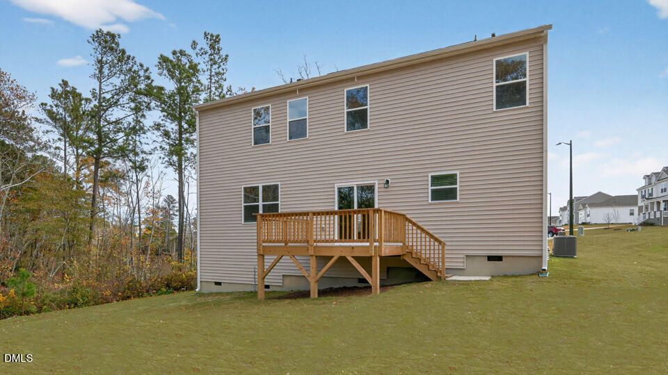 212 Calebs Cor Place Spring Lake, NC 28390 - Photo 36 of 45 a view of a house with a yard and wooden fence