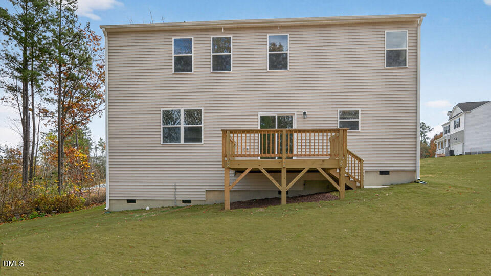 212 Calebs Cor Place Spring Lake, NC 28390 - Photo 37 of 45 a backyard of a house with barbeque oven table and chairs