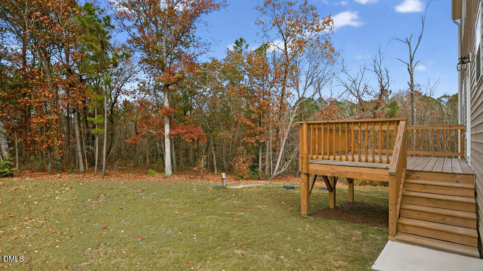 212 Calebs Cor Place Spring Lake, NC 28390 - Photo 38 of 45 a view of a bench in a backyard of a house