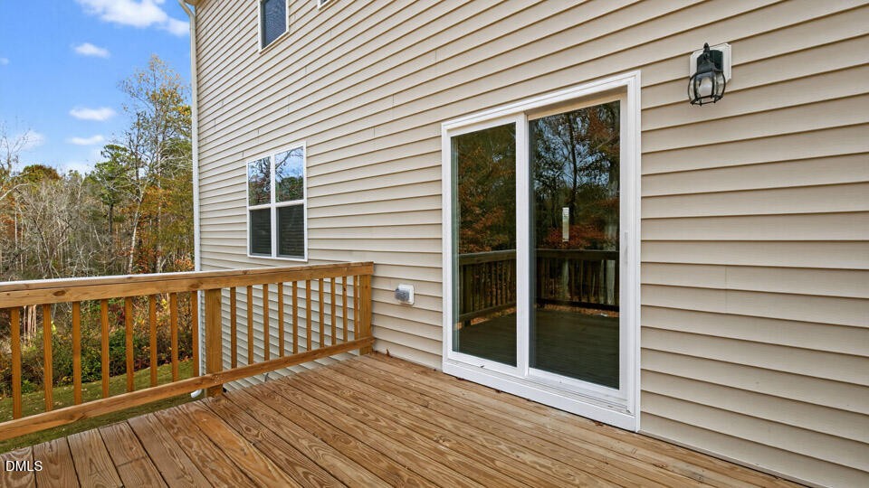 212 Calebs Cor Place Spring Lake, NC 28390 - Photo 39 of 45 a view of a balcony with wooden floor