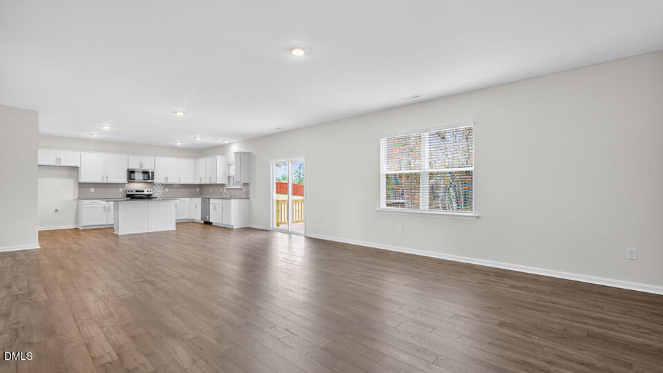 212 Calebs Cor Place Spring Lake, NC 28390 - Photo 8 of 45 a view of kitchen with wooden floor and windows