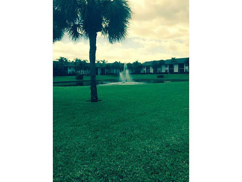 22100 Palms Way, Unit 203 Boca Raton, FL 33433 - Photo 6 of 20 Exterior Front
