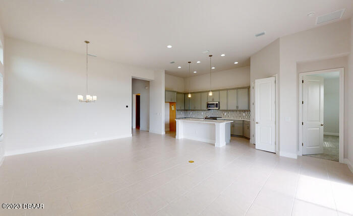 250 Azure Mist Way Daytona Beach, FL 32124 - Photo 7 of 28 7. Kitchen and Living