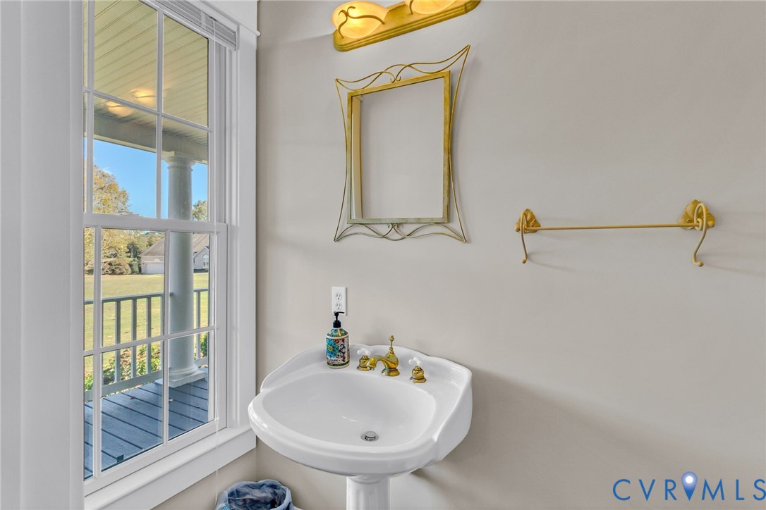 1248 Bancton Road Kinsale, VA 22488 - Photo 15 of 50 a bathroom with a sink and a window