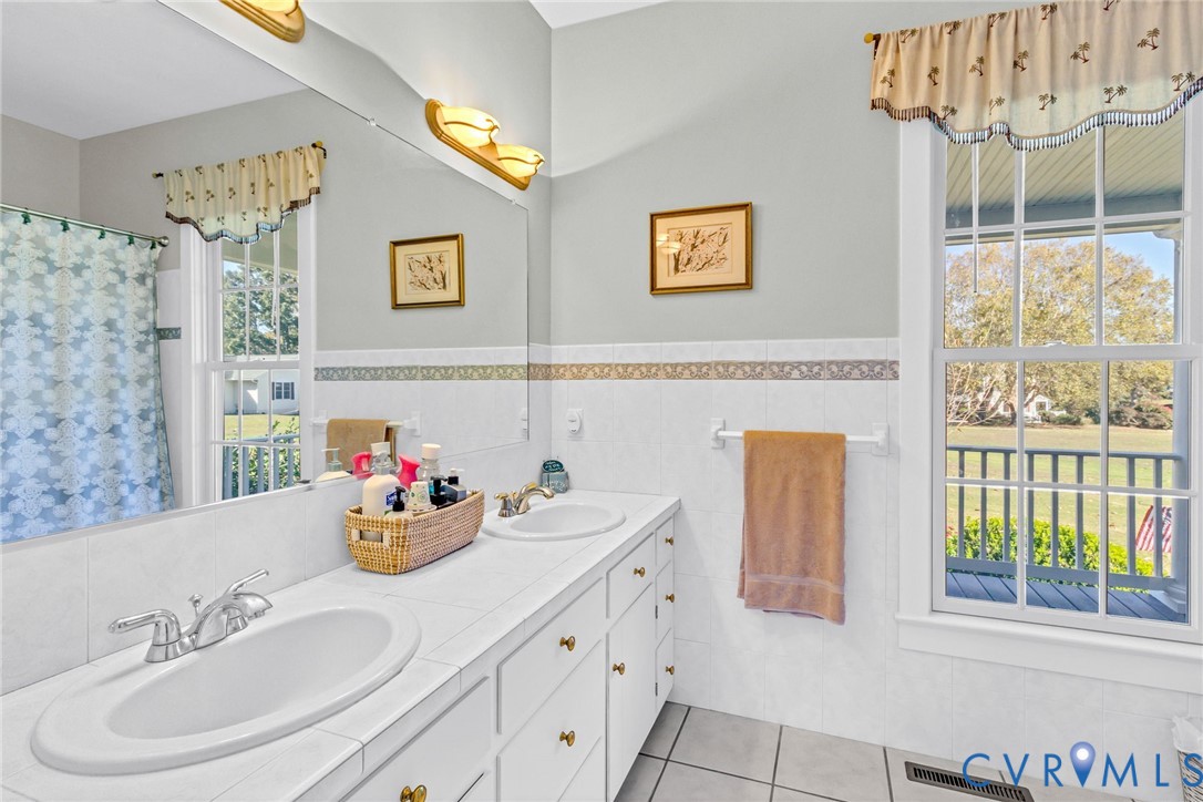1248 Bancton Road Kinsale, VA 22488 - Photo 20 of 50 a bathroom with a sink mirror and vanity