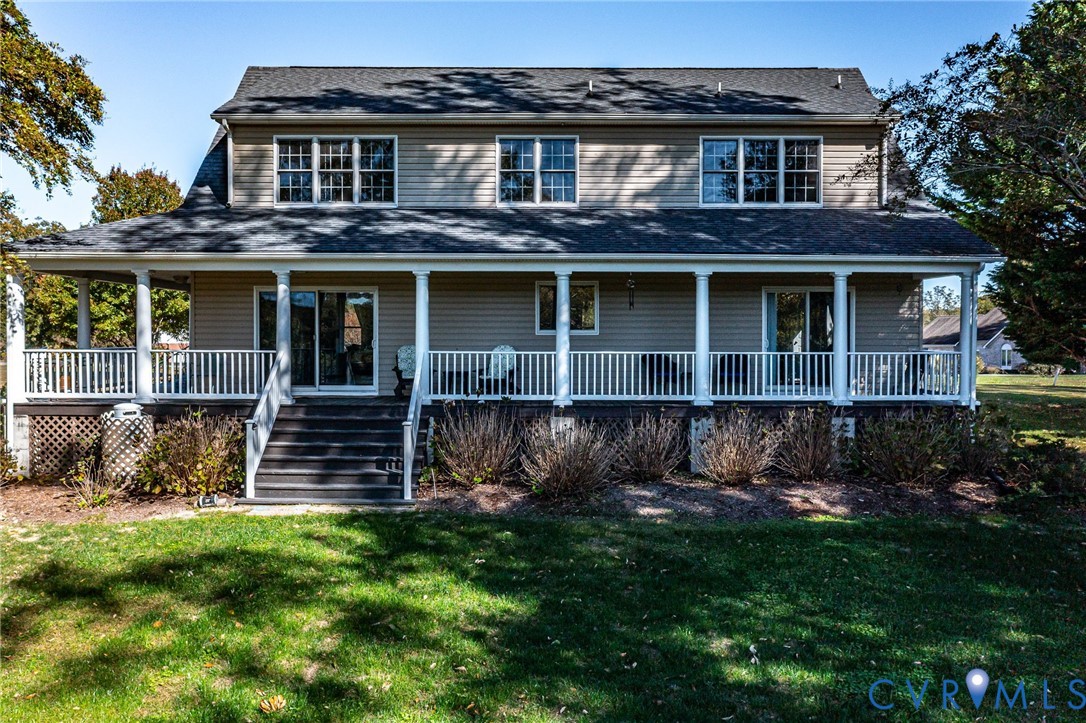 1248 Bancton Road Kinsale, VA 22488 - Photo 43 of 50 a view of a house with a yard plants and large tree
