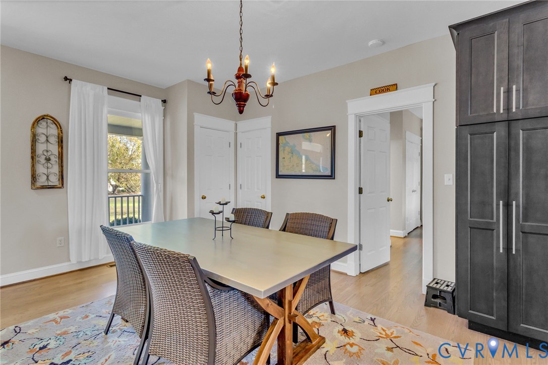 1248 Bancton Road Kinsale, VA 22488 - Photo 5 of 50 a view of a dining room with furniture window and wooden floor
