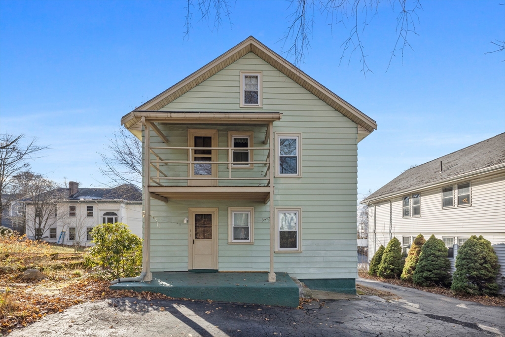 18-20 Pond Street Boston, MA 02136 - Photo 15 of 15 a front view of a house with garden
