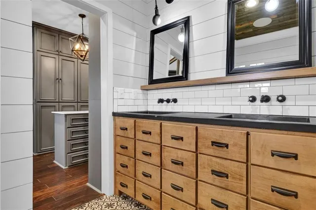 a living room with fireplace furniture and a flat screen tv