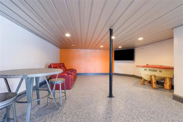 a view of kitchen with refrigerator microwave and wooden floor