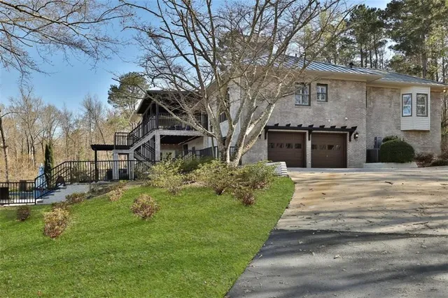 a view of a chairs with wooden fence