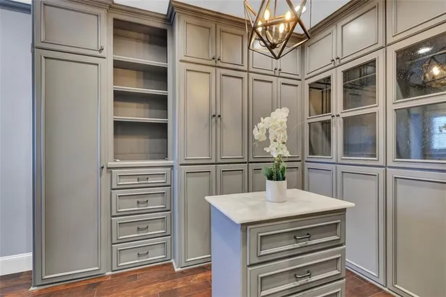a kitchen with cabinets and appliances