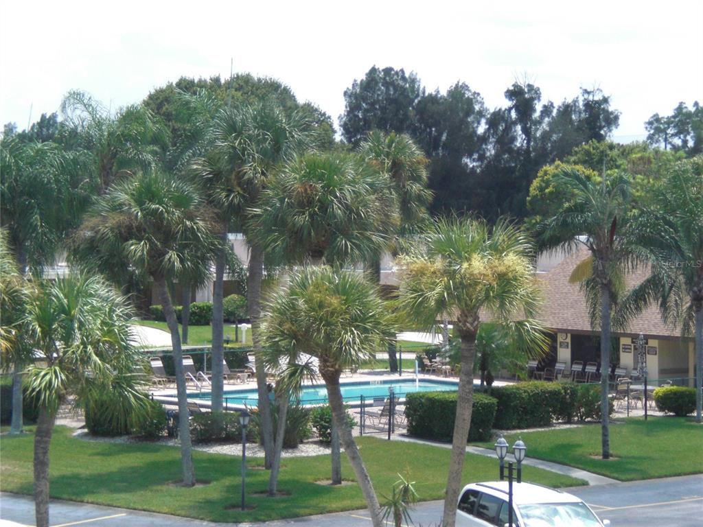 4119 61st Ave Terrace West, Unit 303 Bradenton, FL 34210 - Photo 21 of 22 a view of a park with tree s