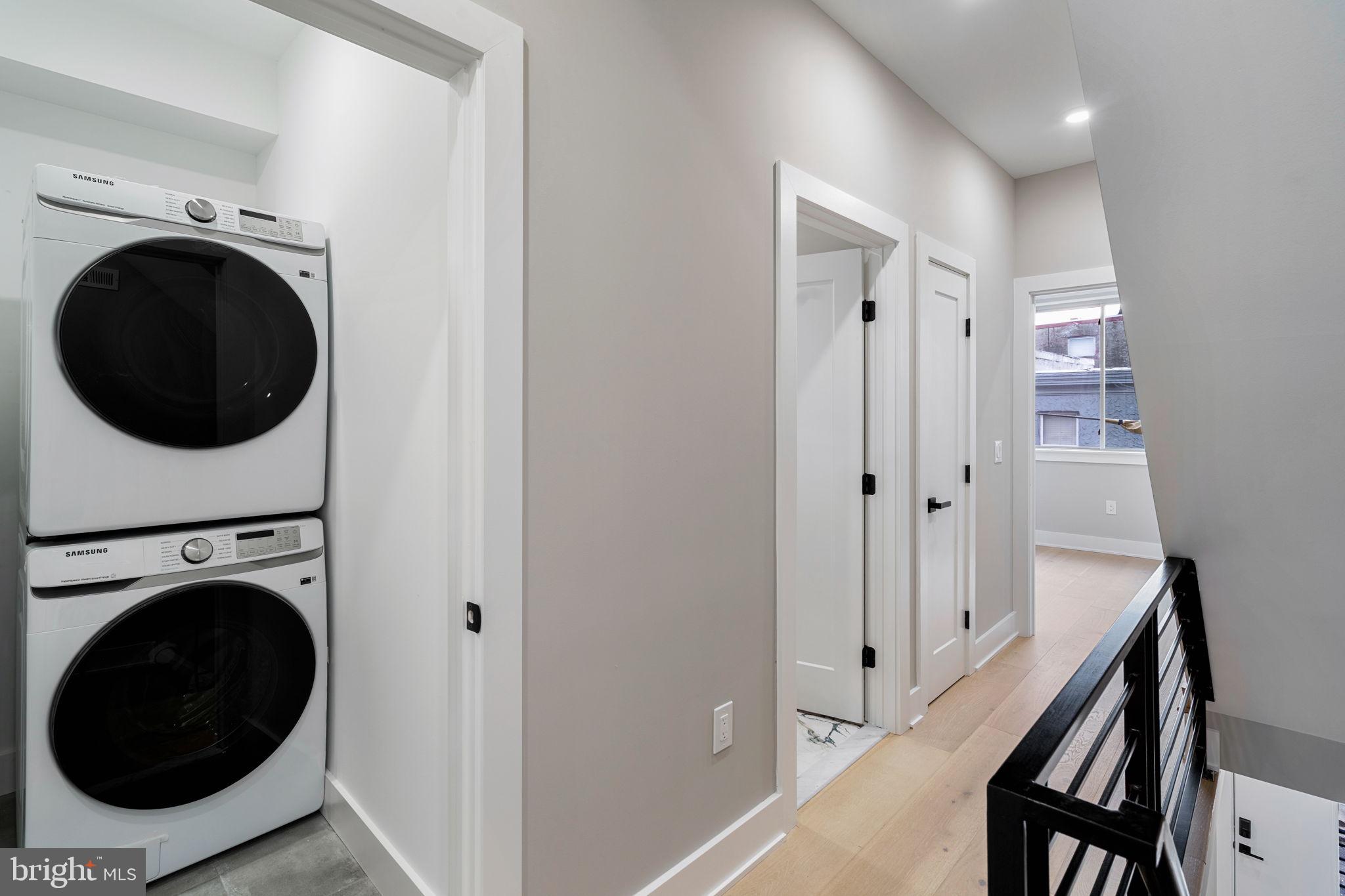 717 Mercy Street Philadelphia, PA 19148 - Photo 26 of 48 a view of a hallway with washer and dryer