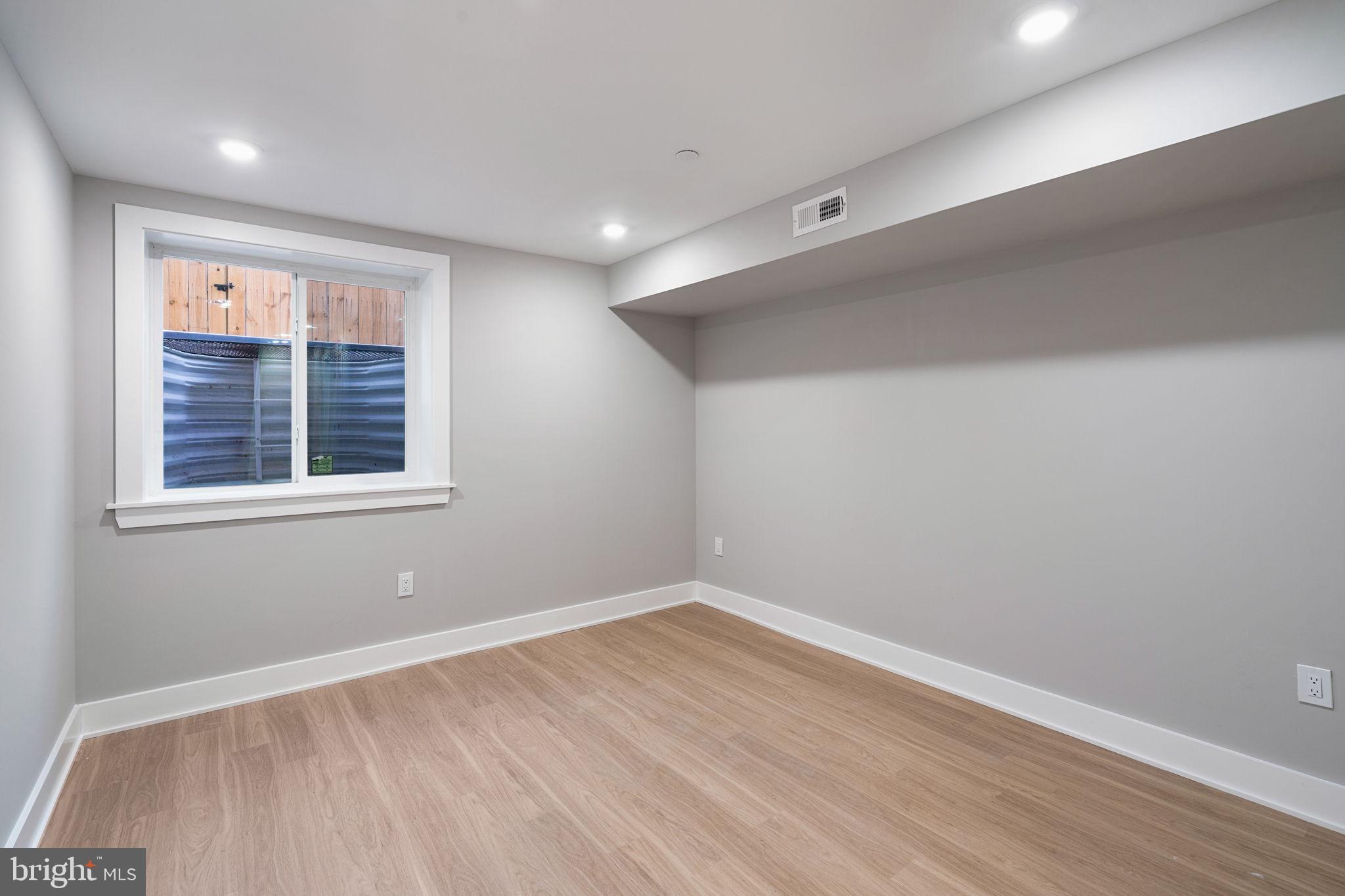717 Mercy Street Philadelphia, PA 19148 - Photo 44 of 48 a view of empty room with wooden floor