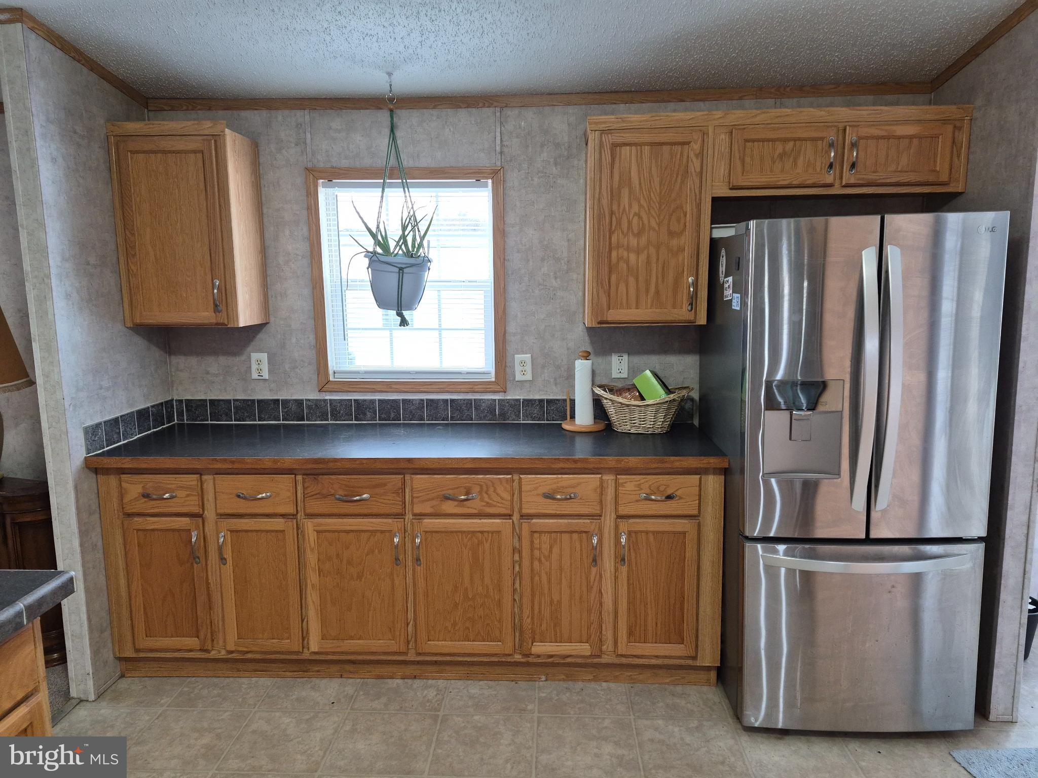 918 Decoy Way, Unit 171 Bear, DE 19701 - Photo 3 of 8 Bright and inviting kitchen space.