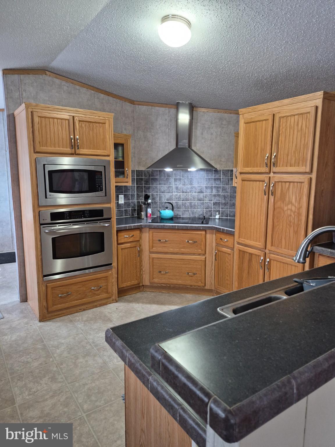 918 Decoy Way, Unit 171 Bear, DE 19701 - Photo 6 of 8 Charming kitchen with modern appliances.