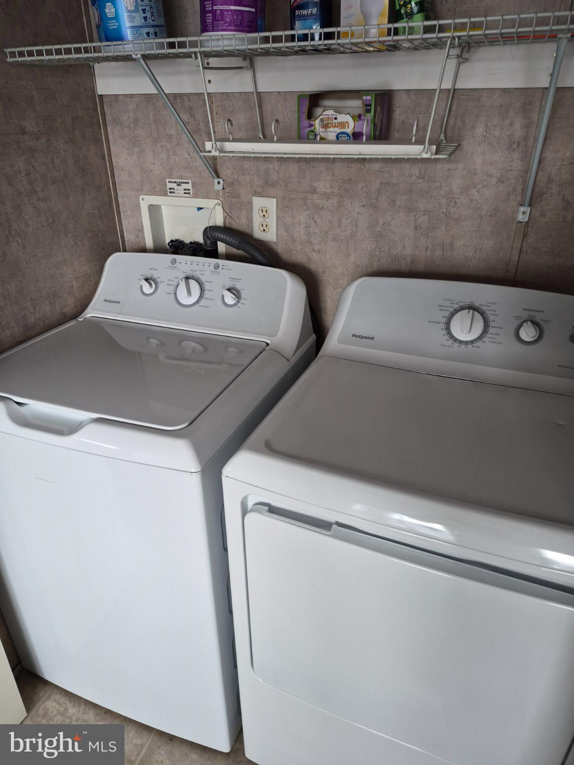918 Decoy Way, Unit 171 Bear, DE 19701 - Photo 7 of 8 Modern laundry appliances in a tidy space.