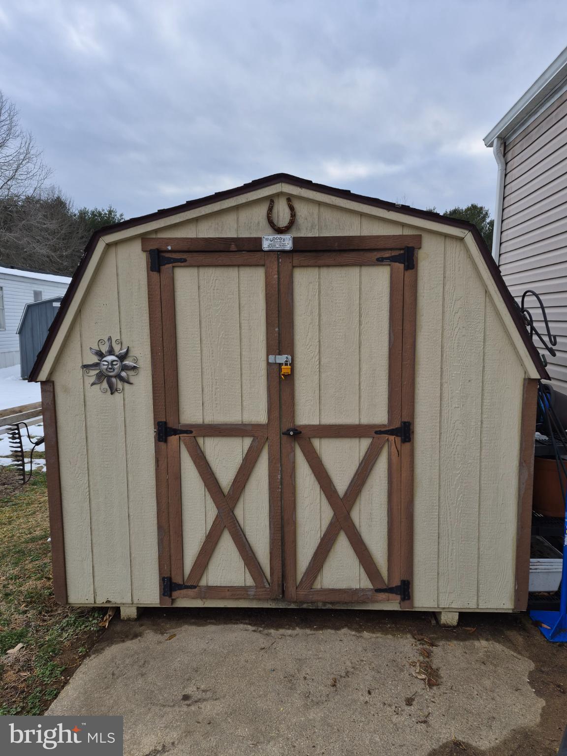 918 Decoy Way, Unit 171 Bear, DE 19701 - Photo 8 of 8 Charming garden shed with rustic appeal.