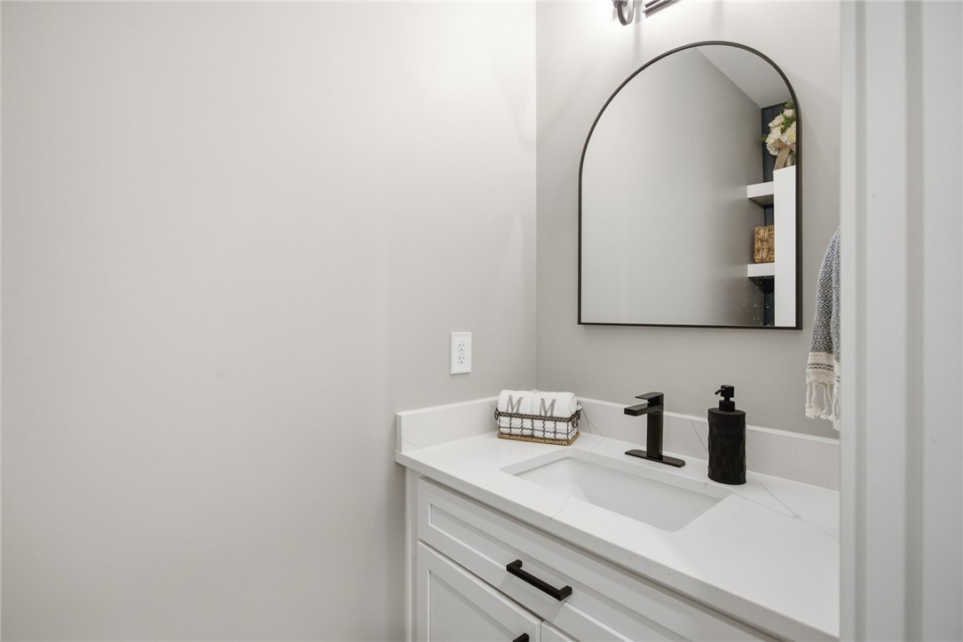 318 Summerall Drive Anderson, SC 29621 - Photo 30 of 42 This bathroom features a contemporary vanity with a sleek sink and a stylish mirror.