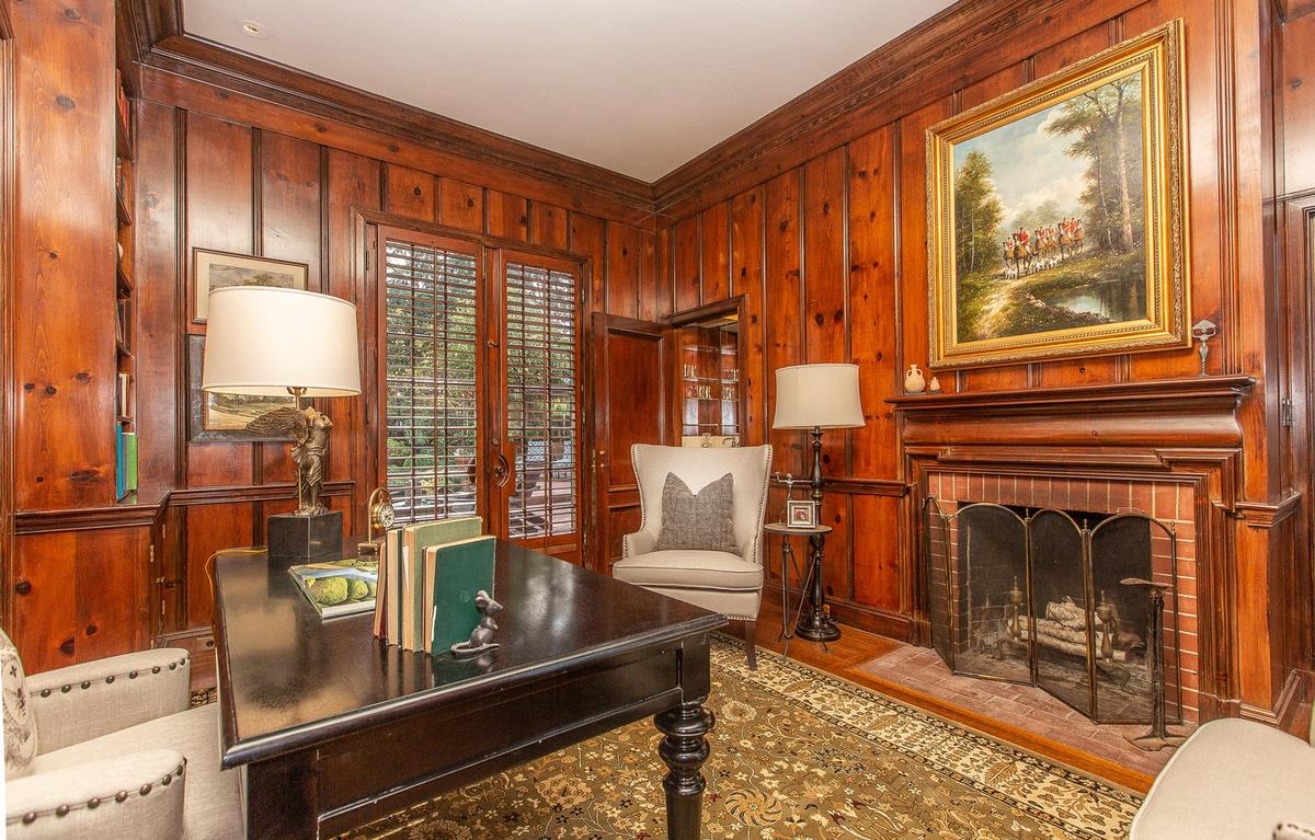 863 Chiltern Road Hillsborough, CA 94010 - Photo 12 of 50 a living room with furniture and a fireplace
