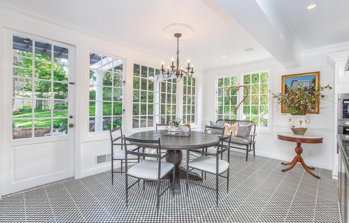863 Chiltern Road Hillsborough, CA 94010 - Photo 14 of 50 a view of a dining room with furniture window and outside view