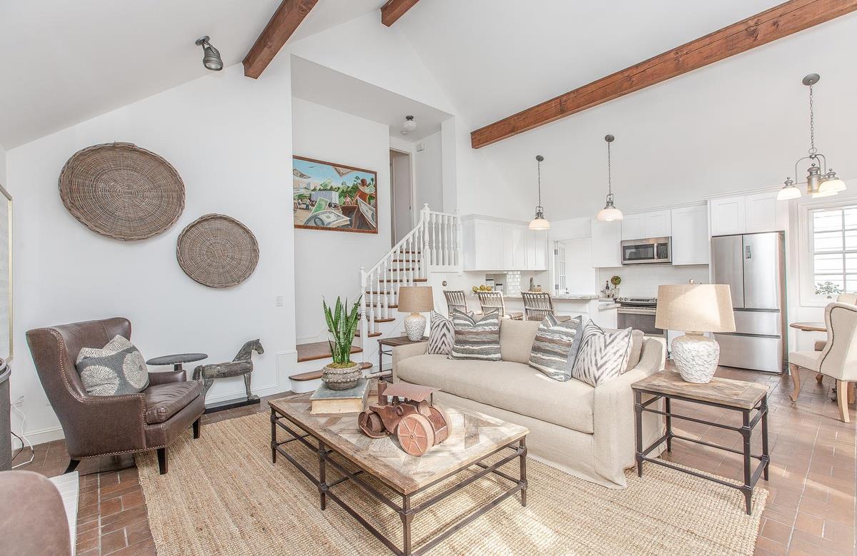 863 Chiltern Road Hillsborough, CA 94010 - Photo 21 of 50 a living room with furniture a rug and white walls