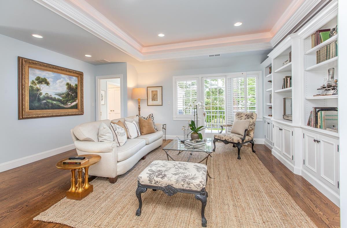 863 Chiltern Road Hillsborough, CA 94010 - Photo 24 of 50 a living room with furniture and a wooden floor