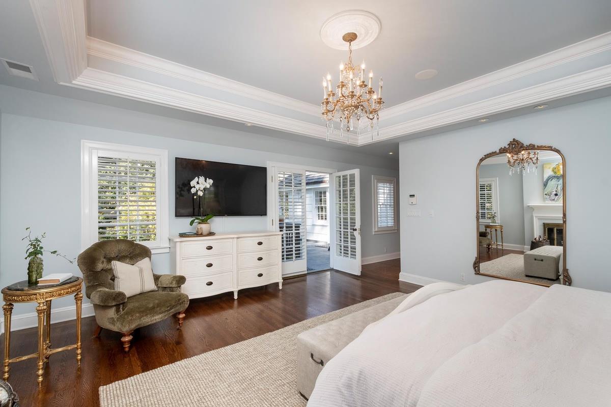 863 Chiltern Road Hillsborough, CA 94010 - Photo 26 of 50 a bedroom with furniture or chandelier and a window