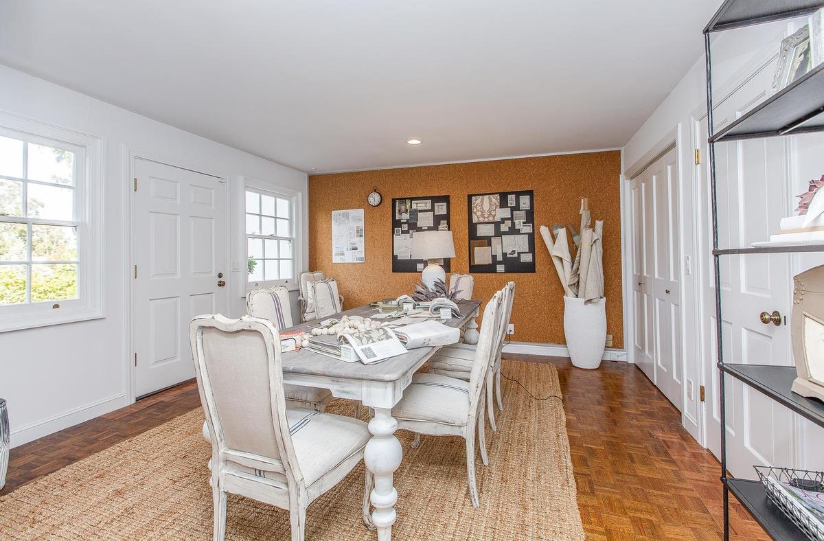 863 Chiltern Road Hillsborough, CA 94010 - Photo 36 of 50 a view of a dining room with furniture window and wooden floor