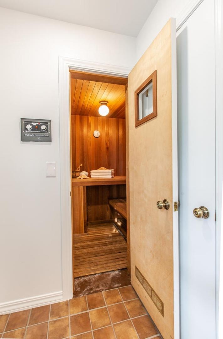 863 Chiltern Road Hillsborough, CA 94010 - Photo 37 of 50 a bathroom with a sink and a mirror