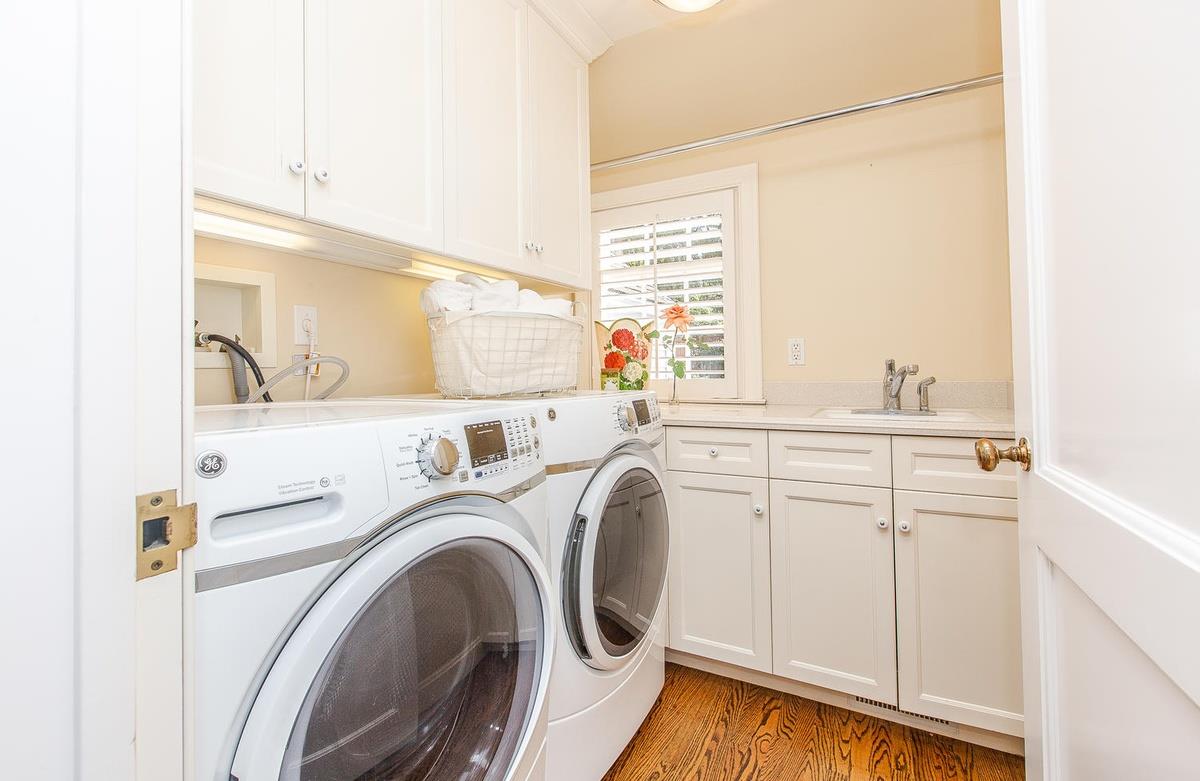 863 Chiltern Road Hillsborough, CA 94010 - Photo 38 of 50 a utility room with dryer and washer