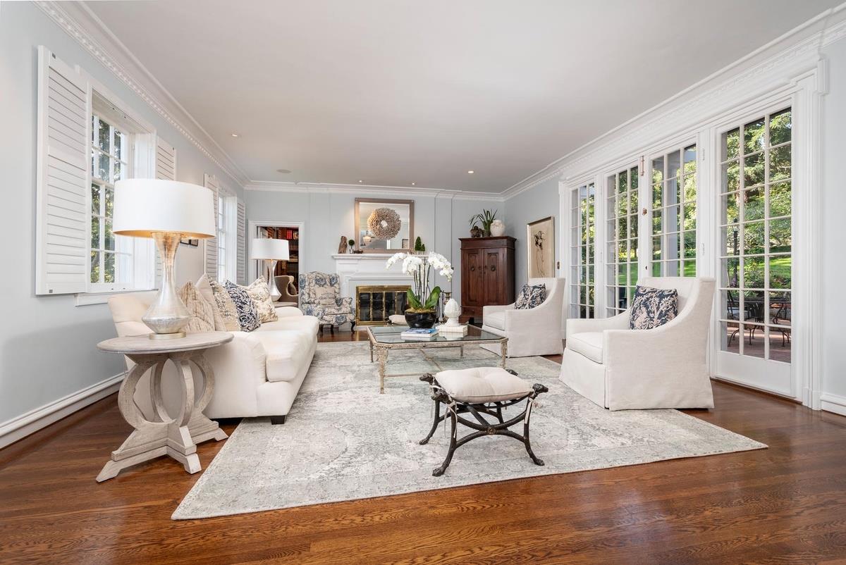 863 Chiltern Road Hillsborough, CA 94010 - Photo 6 of 50 a living room with couches a coffee table and a large window with outer view