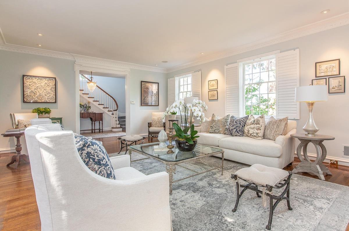 863 Chiltern Road Hillsborough, CA 94010 - Photo 8 of 50 a living room with furniture and a large window