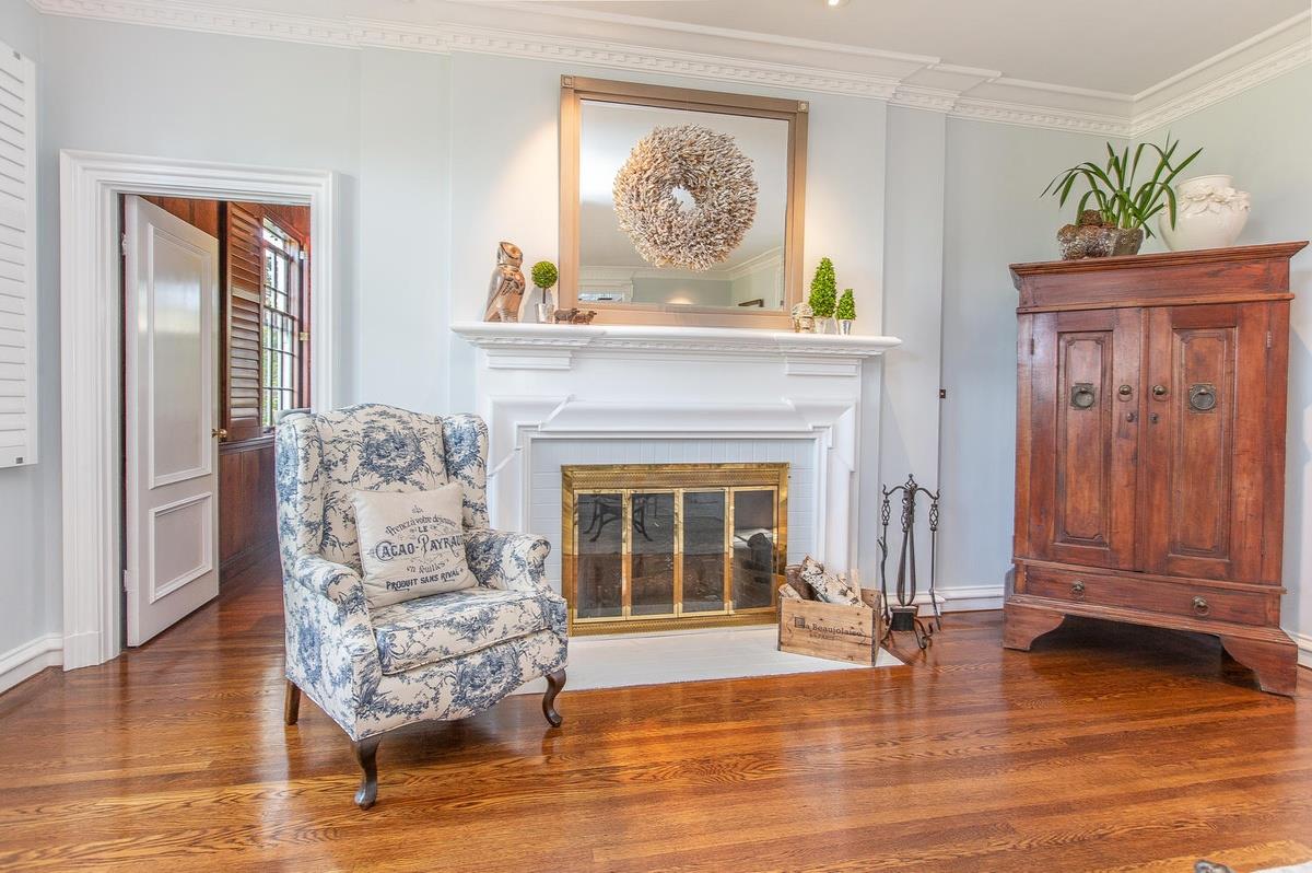 863 Chiltern Road Hillsborough, CA 94010 - Photo 9 of 50 a living room with furniture and a fireplace