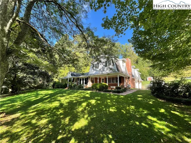 a view of a golf course with a lake