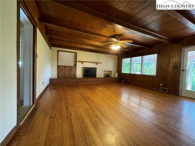 a kitchen with stainless steel appliances a refrigerator and a sink