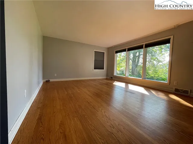 a bathroom with a tub a sink and a shower