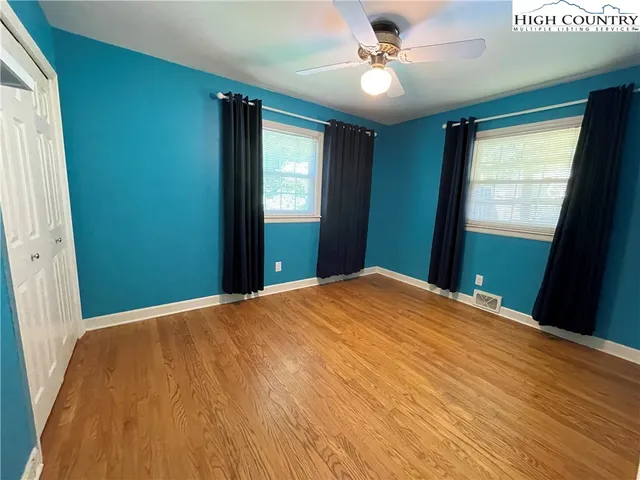 a bathroom with a sink vanity and a mirror