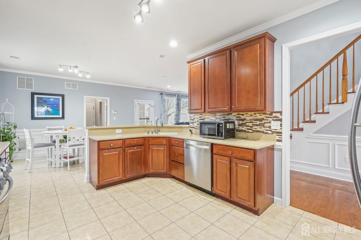 54 Harness Way Chesterfield, NJ 08515 - Photo 20 of 41 a large kitchen with granite countertop a sink and cabinets