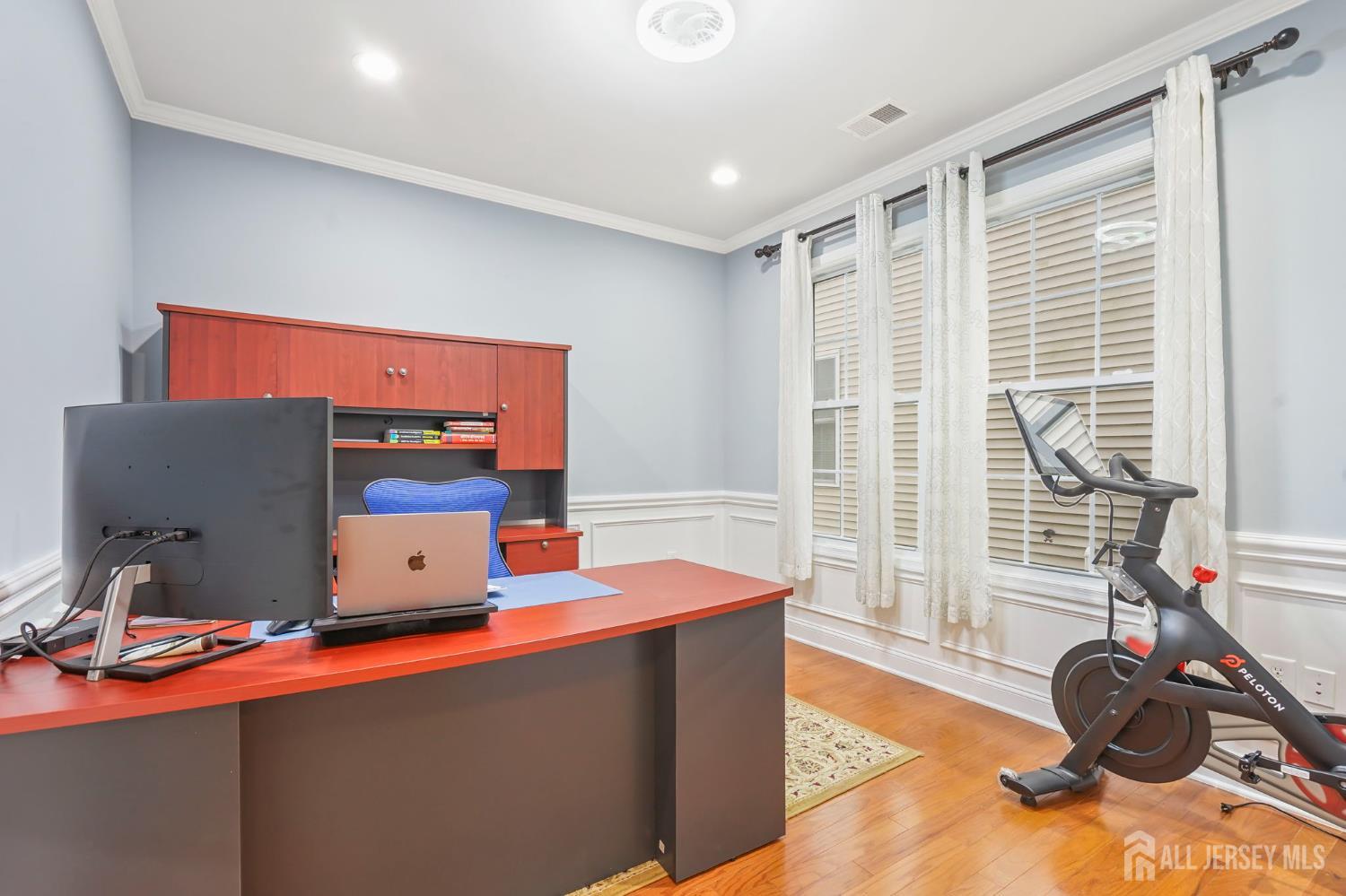 54 Harness Way Chesterfield, NJ 08515 - Photo 21 of 41 a room with furniture and a flat screen tv