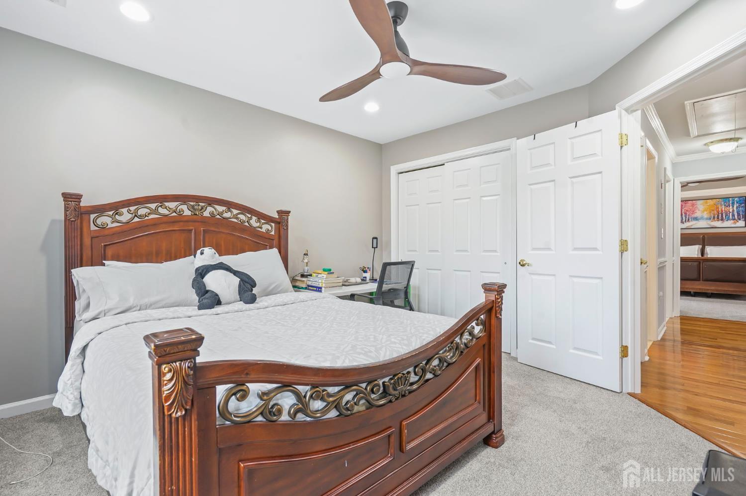54 Harness Way Chesterfield, NJ 08515 - Photo 28 of 41 a bed room with a bed and a chair