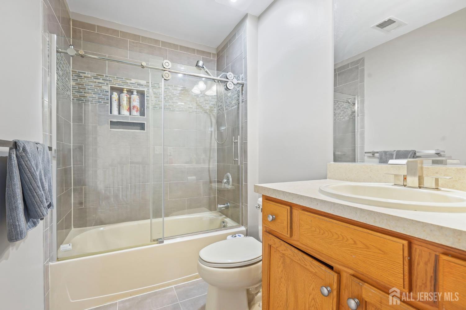 54 Harness Way Chesterfield, NJ 08515 - Photo 29 of 41 a bathroom with a granite countertop sink toilet and shower
