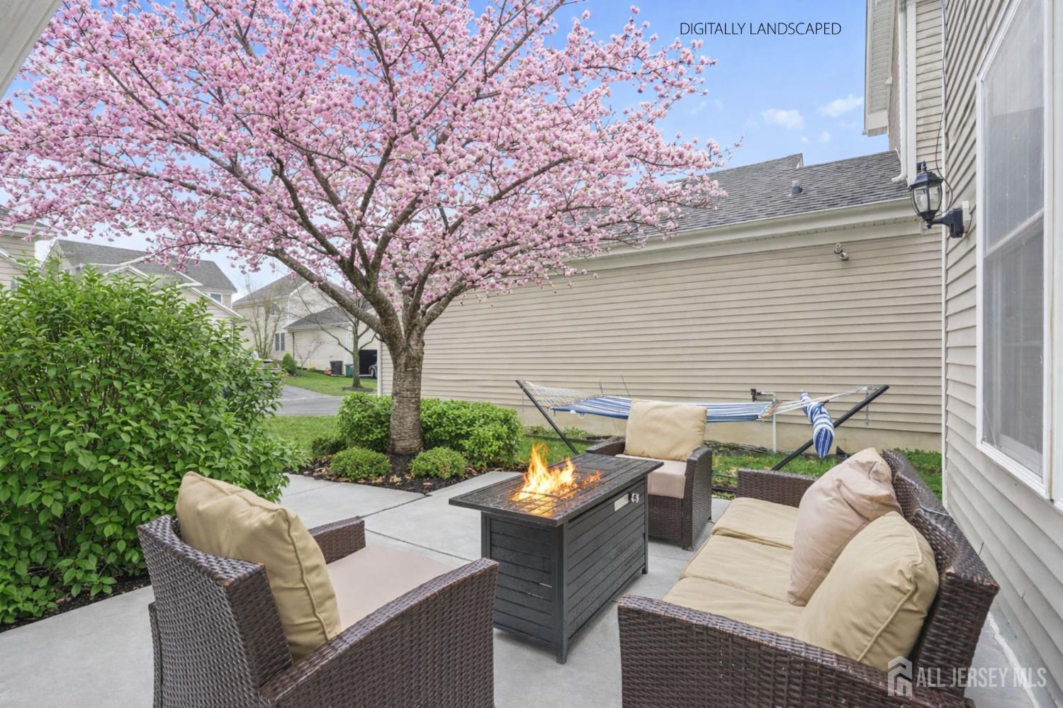 54 Harness Way Chesterfield, NJ 08515 - Photo 36 of 41 a view of backyard of house with seating space