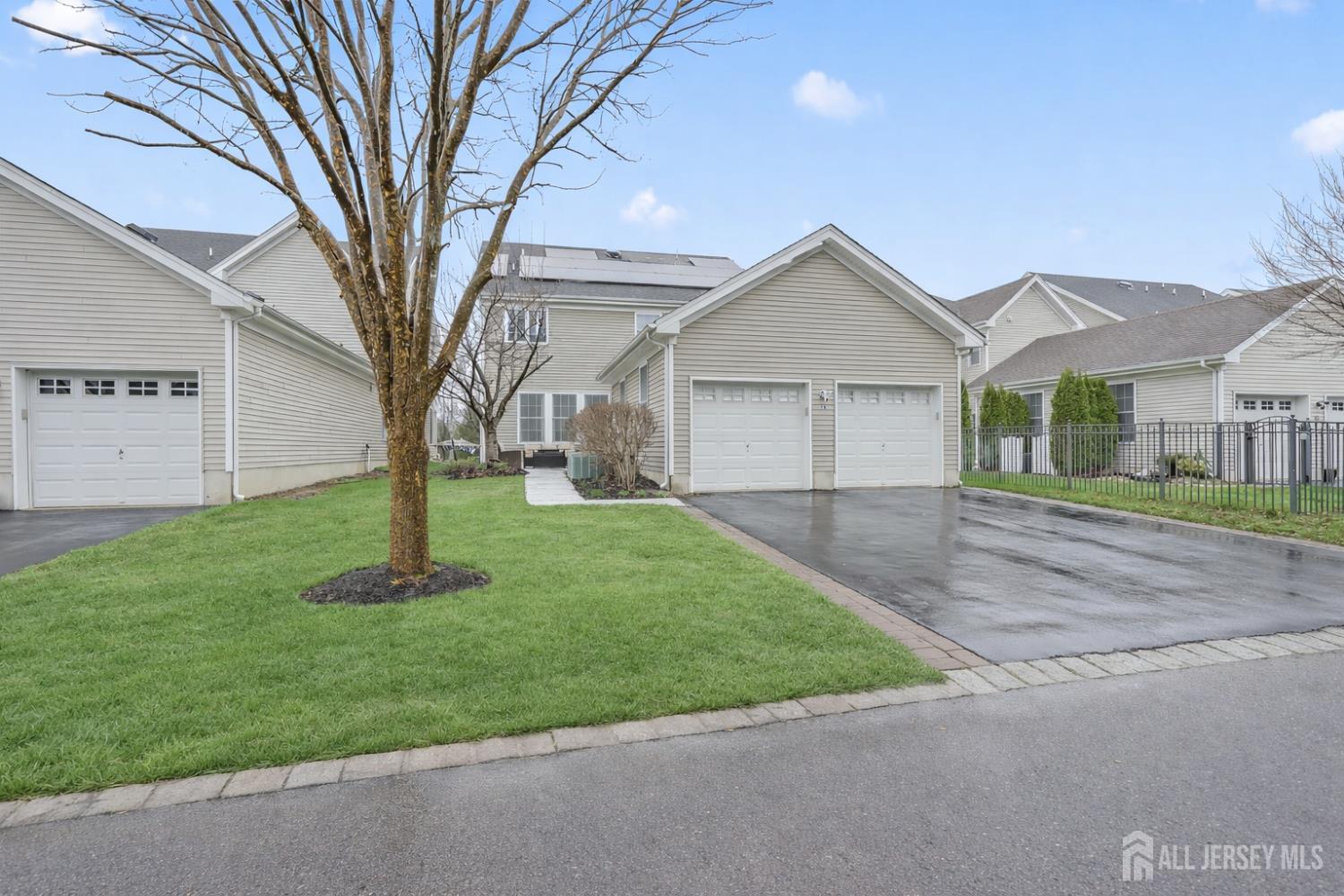 54 Harness Way Chesterfield, NJ 08515 - Photo 39 of 41 a front view of house with a garden
