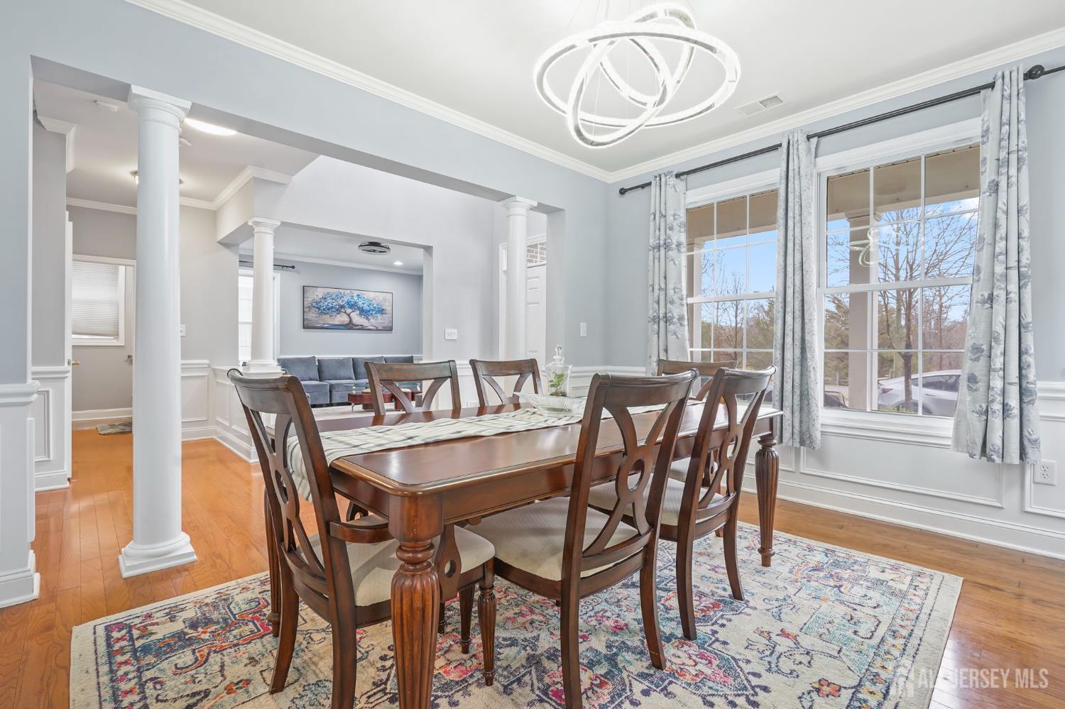 54 Harness Way Chesterfield, NJ 08515 - Photo 10 of 41 a view of a dining room with furniture window and wooden floor