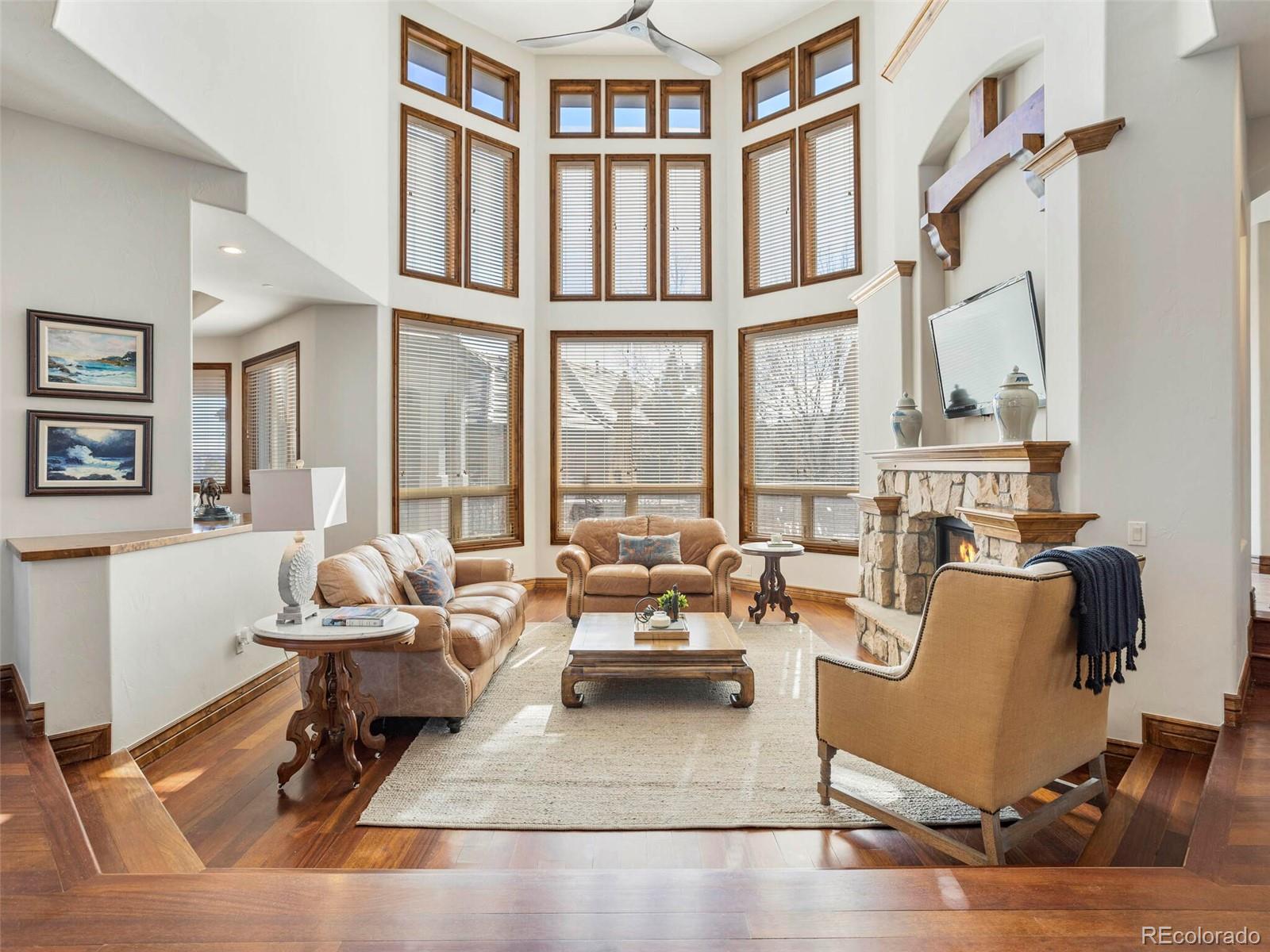1176 Buffalo Ridge Road Castle Pines, CO 80108 - Photo 3 of 37 a living room with furniture